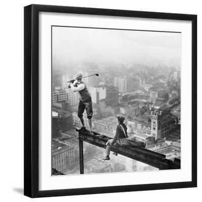 Golfer Teeing off on Girder High above City - Black Framed Art Print Wall Art, 16x16