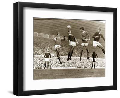 Manchester United vs. Arsenal, Football Match at Old Trafford, October 1967 - Black Framed Art Print Wall Art, 12x9