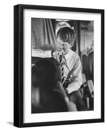 Senator Robert F. Kennedy Aboard Plane During Trip to Help Local Candidates - Black Framed Art Print Wall Art, 12x16