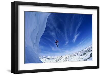 Skier Jumping from Mountain Ledge - Black Framed Art Print Wall Art, 18x12