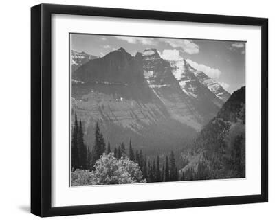Valley Snow Covered Mountains In Background "In Glacier National Park" Montana. 1933-1942 - Black Framed Art Print Wall Art, 16x12 Valley Snow Covered Mountains In Background "In Glacier National Park" Montana. 1933-1942 - Black Framed Art Print Wall Art, 16x12